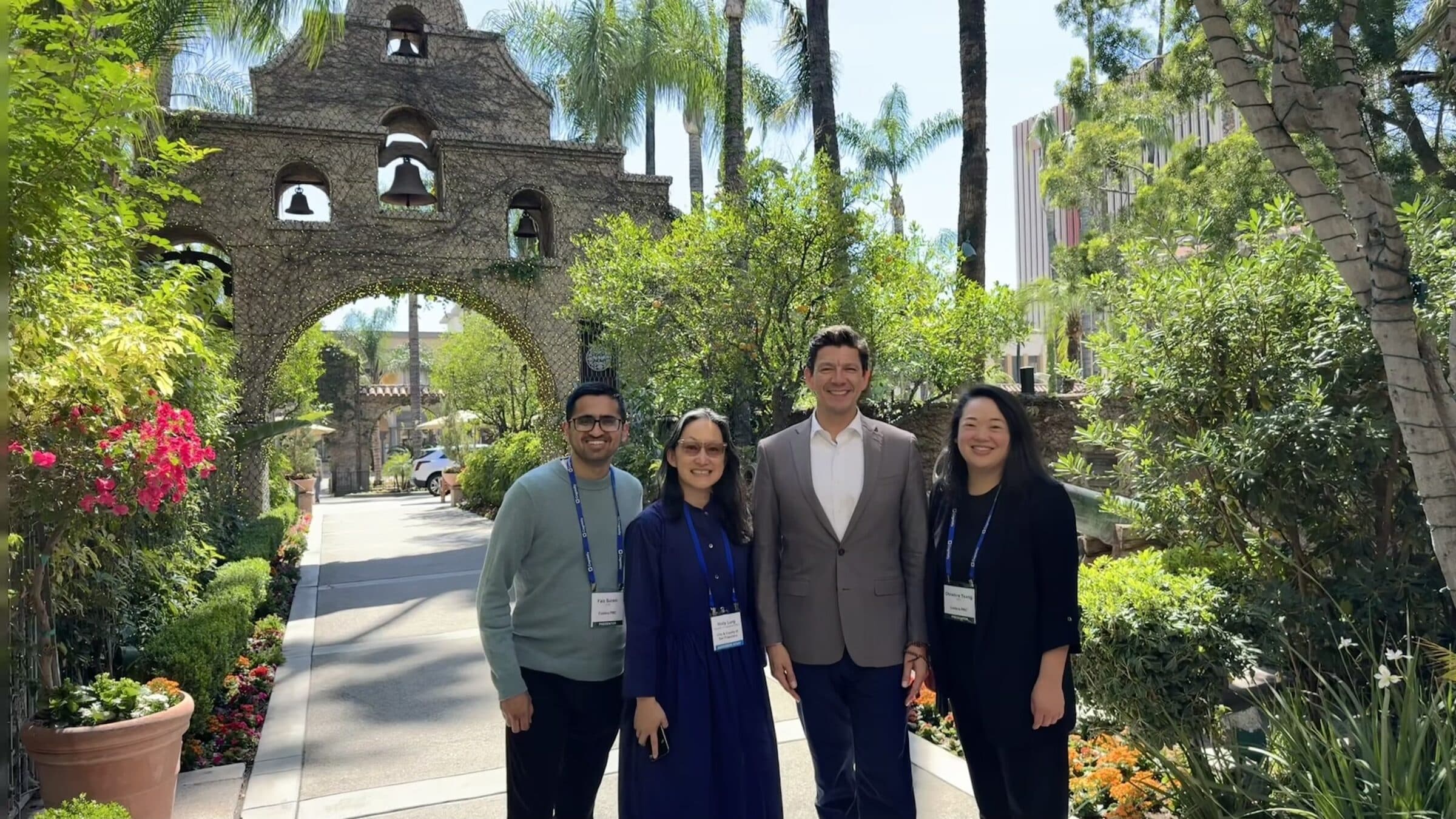 From left: Faiz Surani, Holly Lung, Assessor-Recorder Joaquín Torres, and Christine Tsang in the garden of the Mission Inn in Riverside.